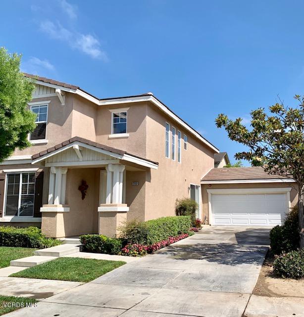 2153 Ribera Drive Oxnard, CA 93030 - Photo 2 of 34 a front view of a house with a yard