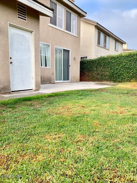 2153 Ribera Drive Oxnard, CA 93030 - Photo 33 of 34 a view of a house with backyard and garden