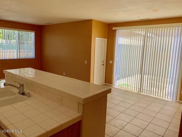 2153 Ribera Drive Oxnard, CA 93030 - Photo 6 of 34 a view of an empty room with windows