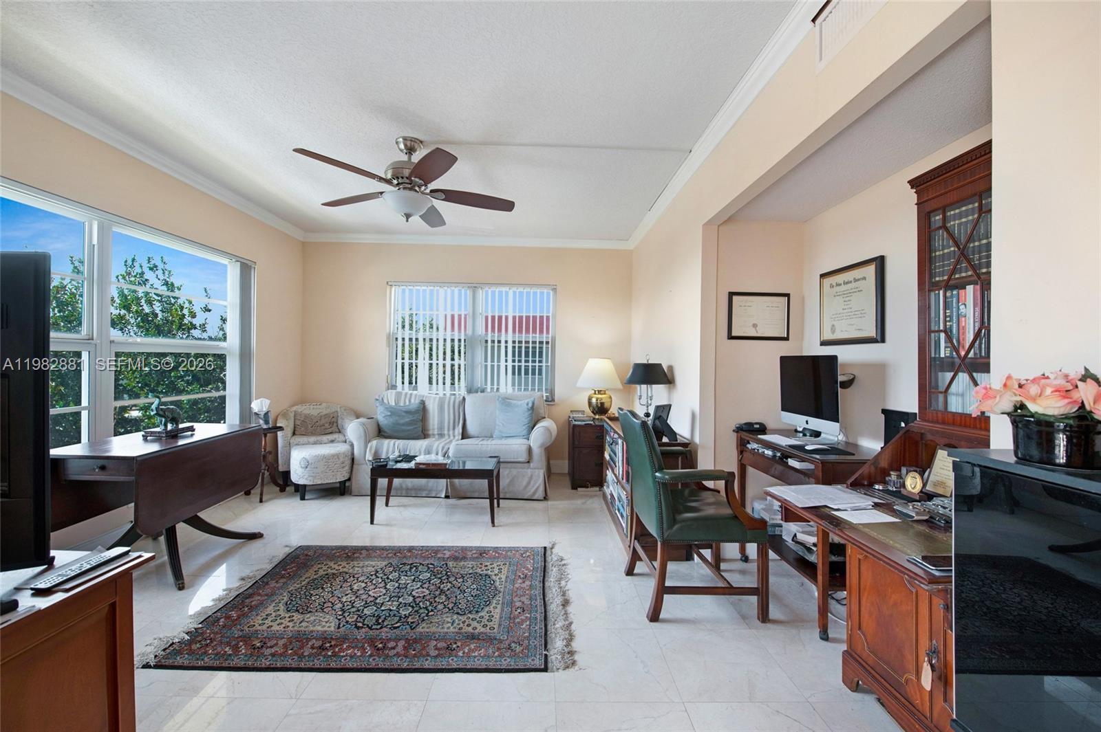 3050 Northeast 48th Court, Unit 401 Lighthouse Point, FL 33064 - Photo 10 of 35 a living room with furniture and a large window
