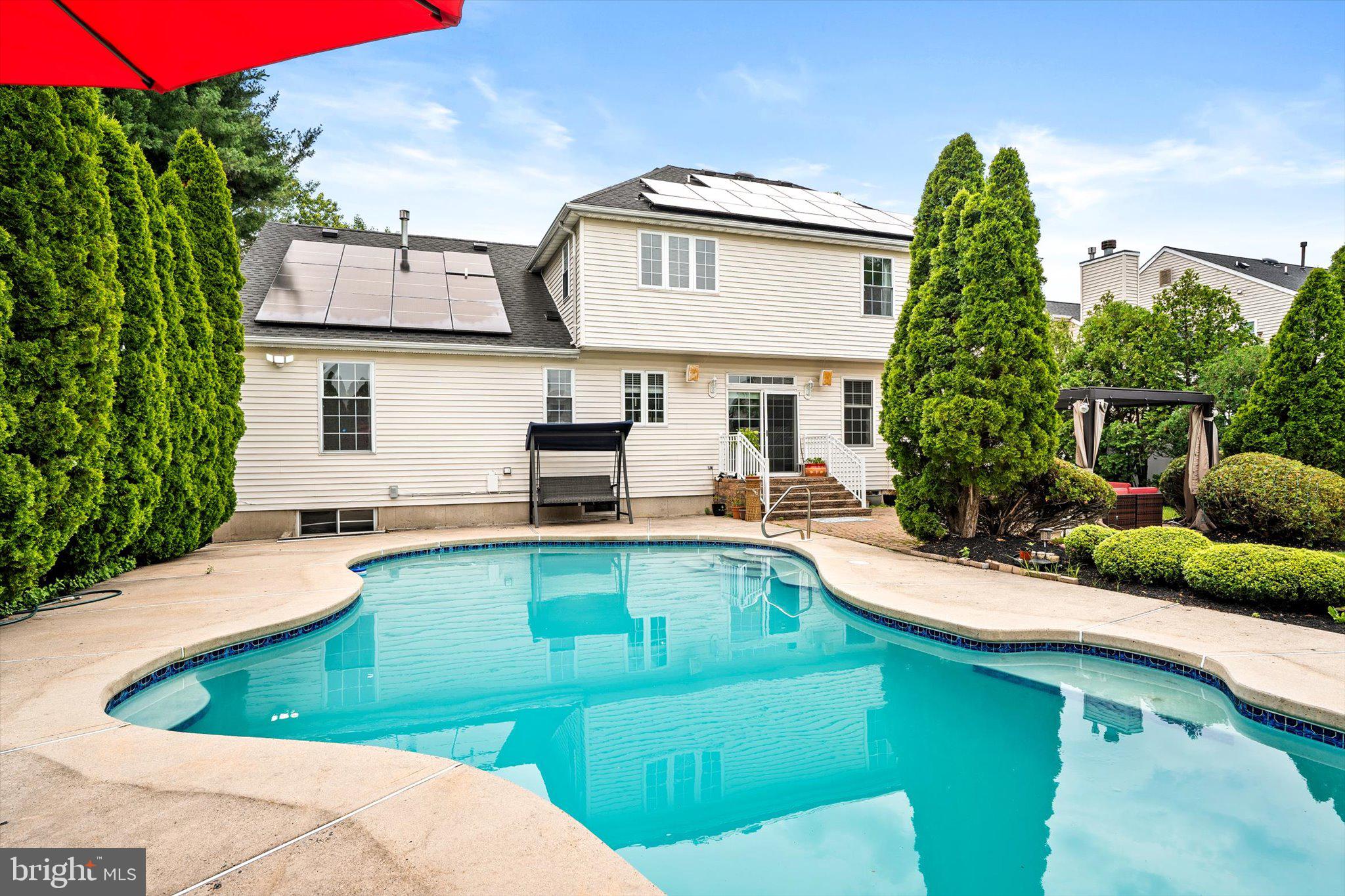 12 Wendover Road East Windsor, NJ 08520 - Photo 37 of 51 Serene backyard oasis with pool.