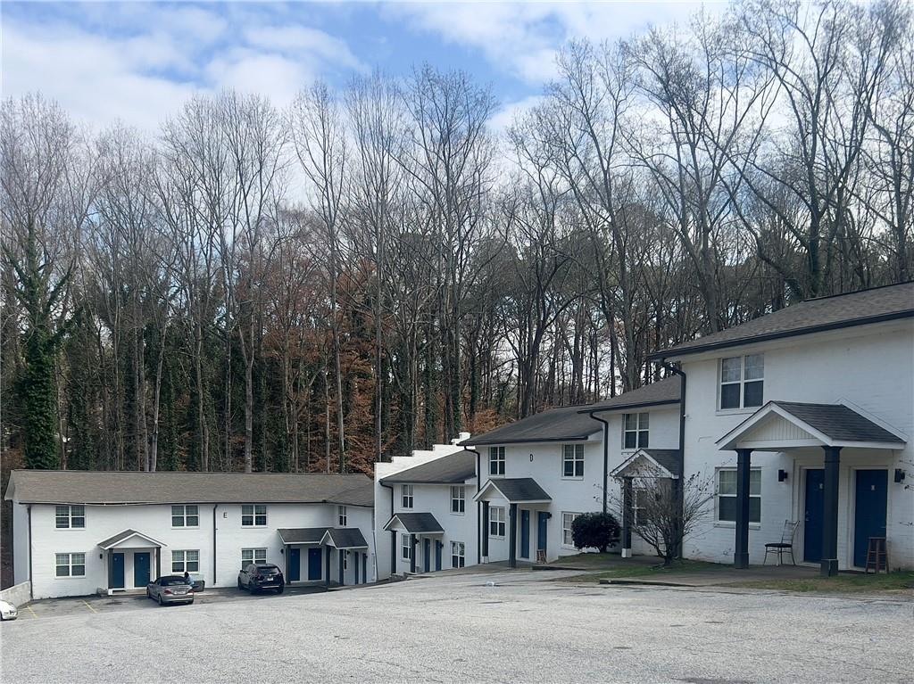 3669 Martin Luther King Junior Drive Southwest Atlanta, GA 30331 - Photo 22 of 24 a front view of a building with trees