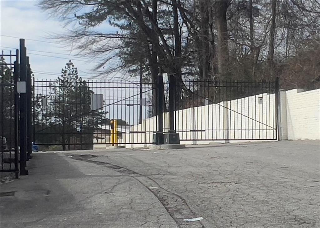 3669 Martin Luther King Junior Drive Southwest Atlanta, GA 30331 - Photo 23 of 24 a view of a white fence in the roof deck