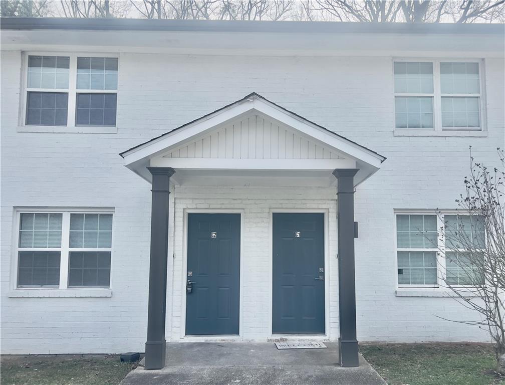 3669 Martin Luther King Junior Drive Southwest Atlanta, GA 30331 - Photo 3 of 24 a view of a house with a yard and balcony