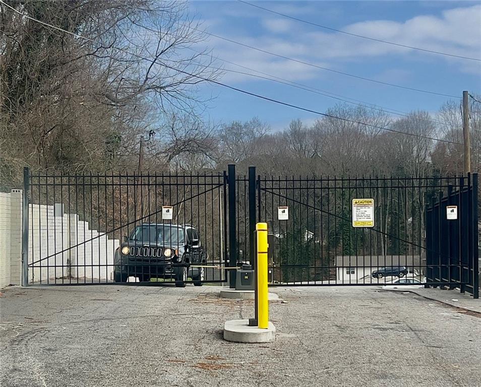 3669 Martin Luther King Junior Drive Southwest Atlanta, GA 30331 - Photo 4 of 24 a view of a park with iron fence