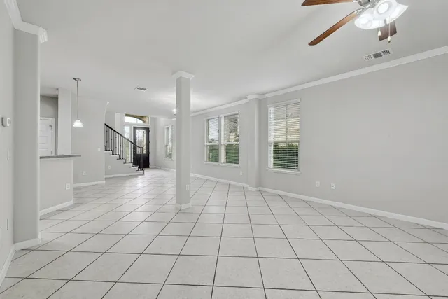 a view of an empty room and window