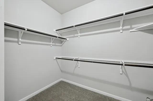 a view of a room with racks on the wall