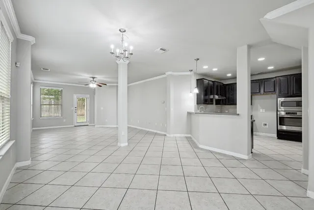 a view of a kitchen with a sink and an oven