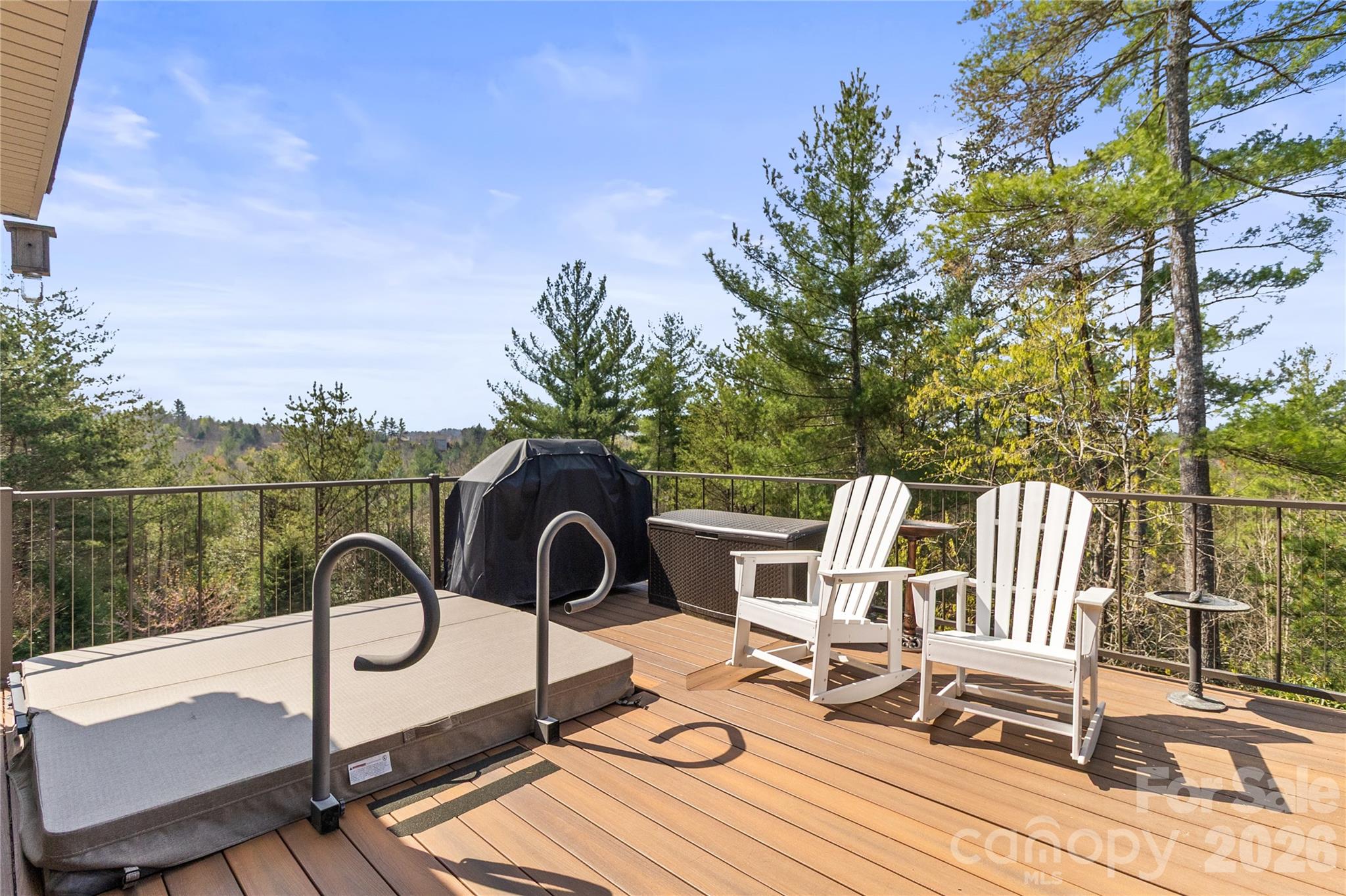1103 River Ridge Way Lenoir, NC 28645 - Photo 4 of 46 a view of a chairs and table on the terrace