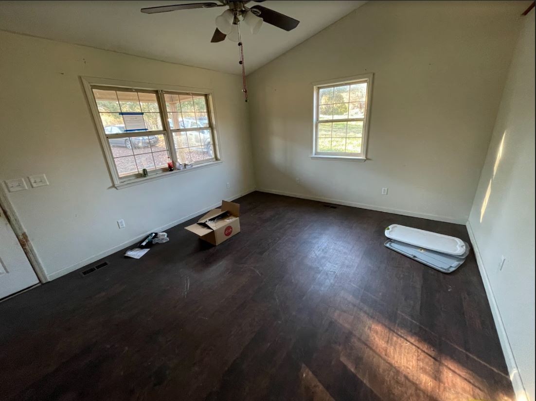 150 Scenic Drive Spring City, TN 37381 - Photo 3 of 13 an empty room with windows