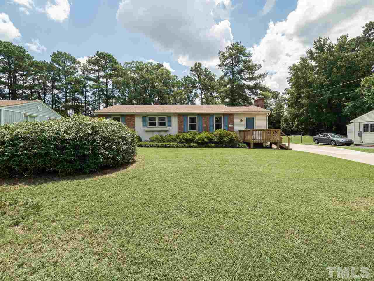 3308 Apache Drive Raleigh, NC 27609 - Photo 2 of 29 a front view of a house with garden