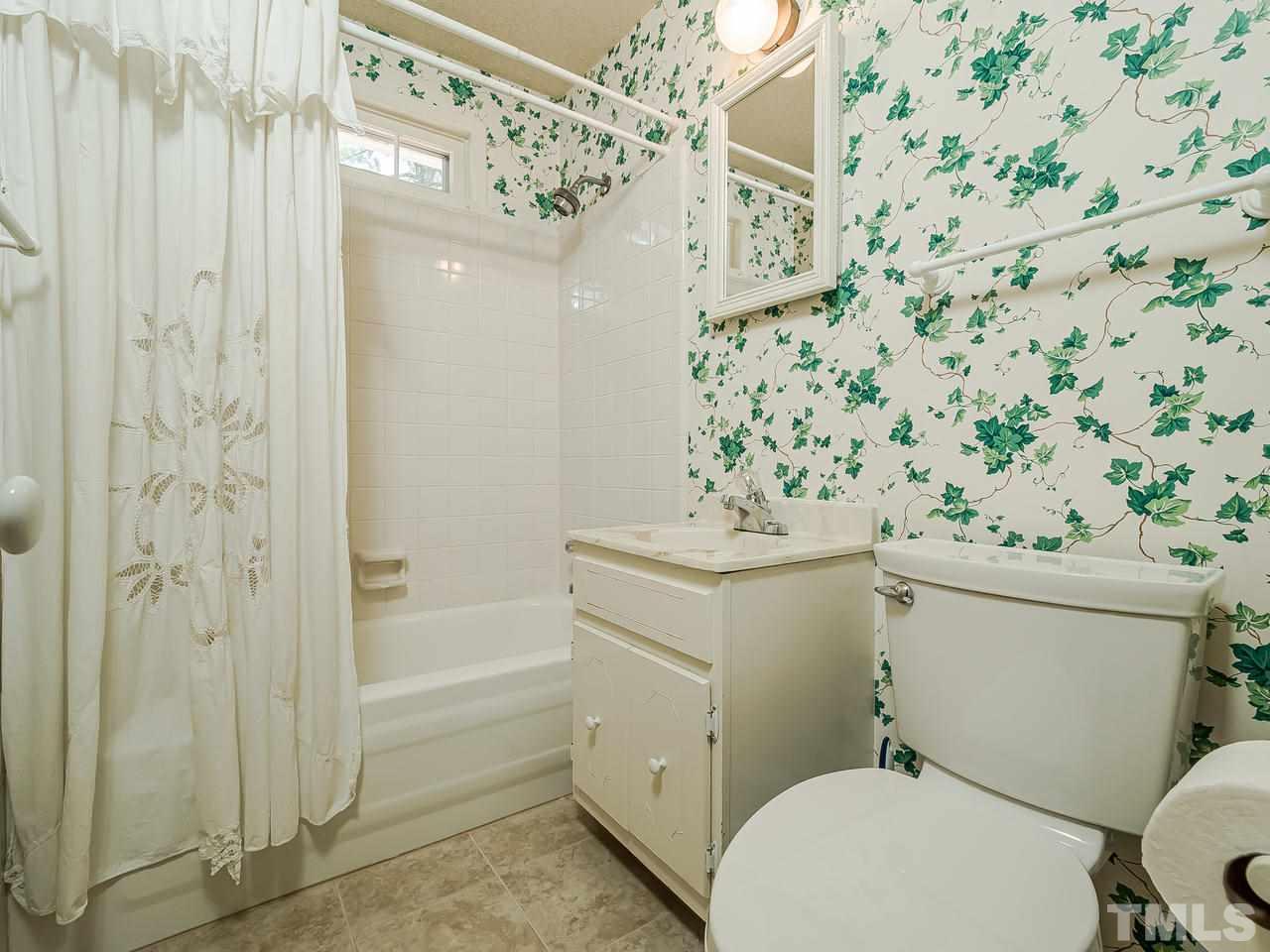 3308 Apache Drive Raleigh, NC 27609 - Photo 17 of 29 a bathroom with a sink toilet and shower