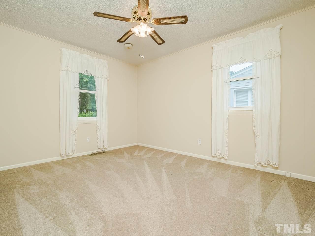 3308 Apache Drive Raleigh, NC 27609 - Photo 23 of 29 a view of an empty room with a window