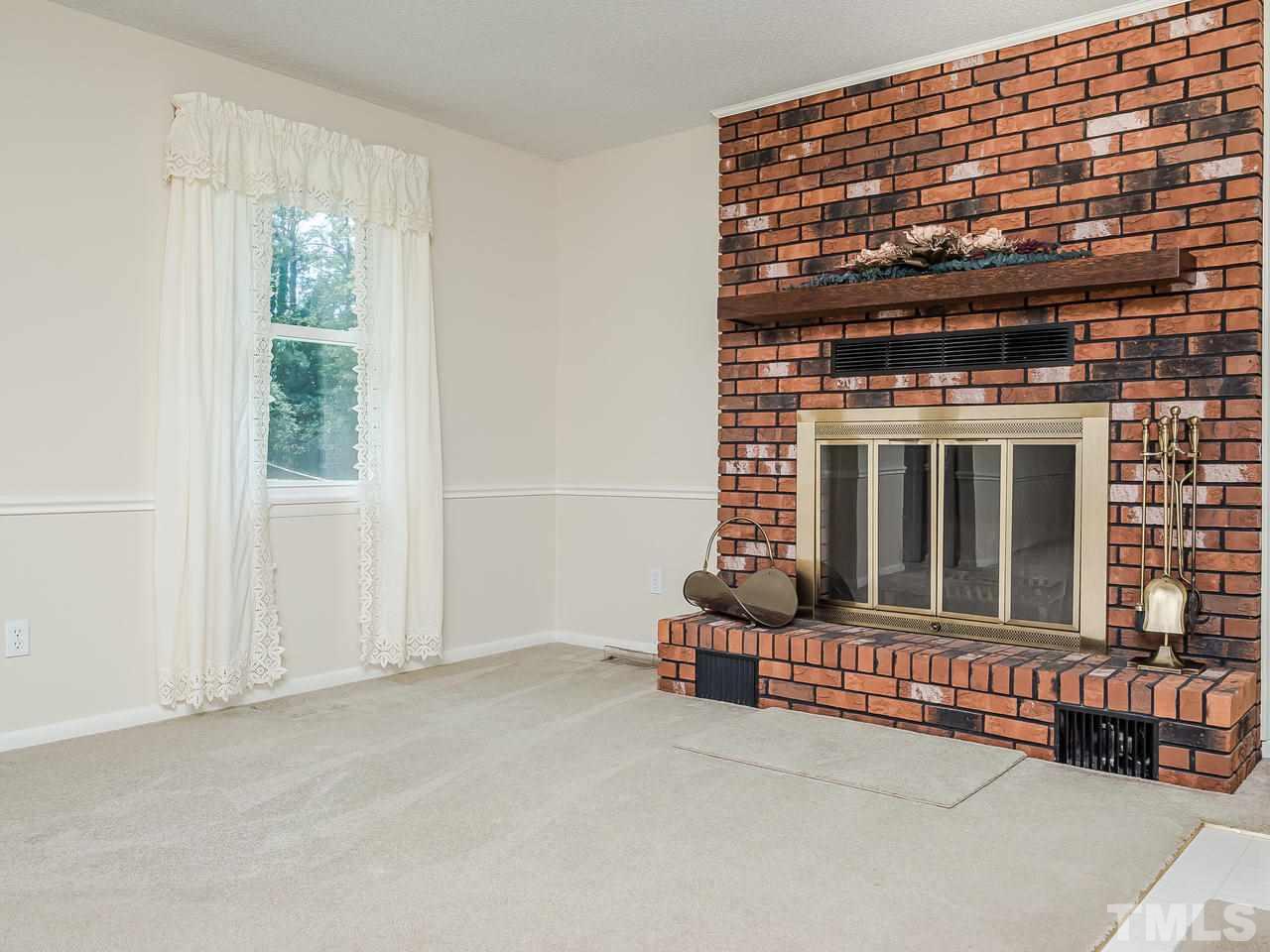3308 Apache Drive Raleigh, NC 27609 - Photo 6 of 29 a living room with furniture
