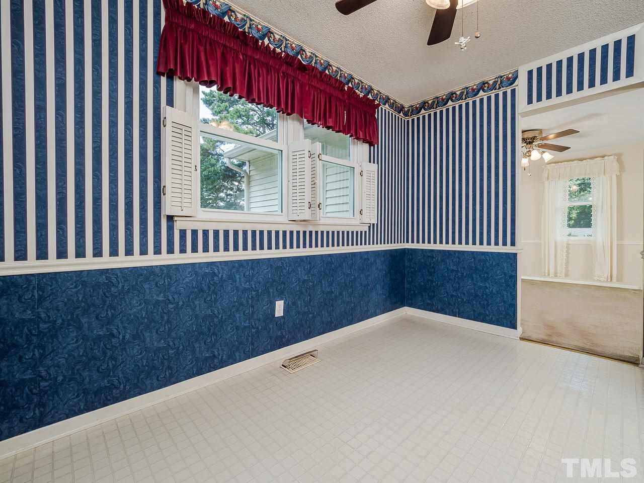 3308 Apache Drive Raleigh, NC 27609 - Photo 9 of 29 a view of an empty room with a window