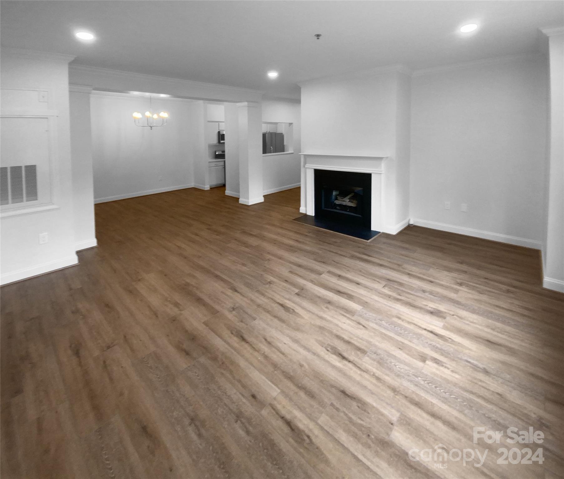 5601 Fairview Road, Unit 5 Charlotte, NC 28209 - Photo 7 of 16 a view of a livingroom with a fireplace