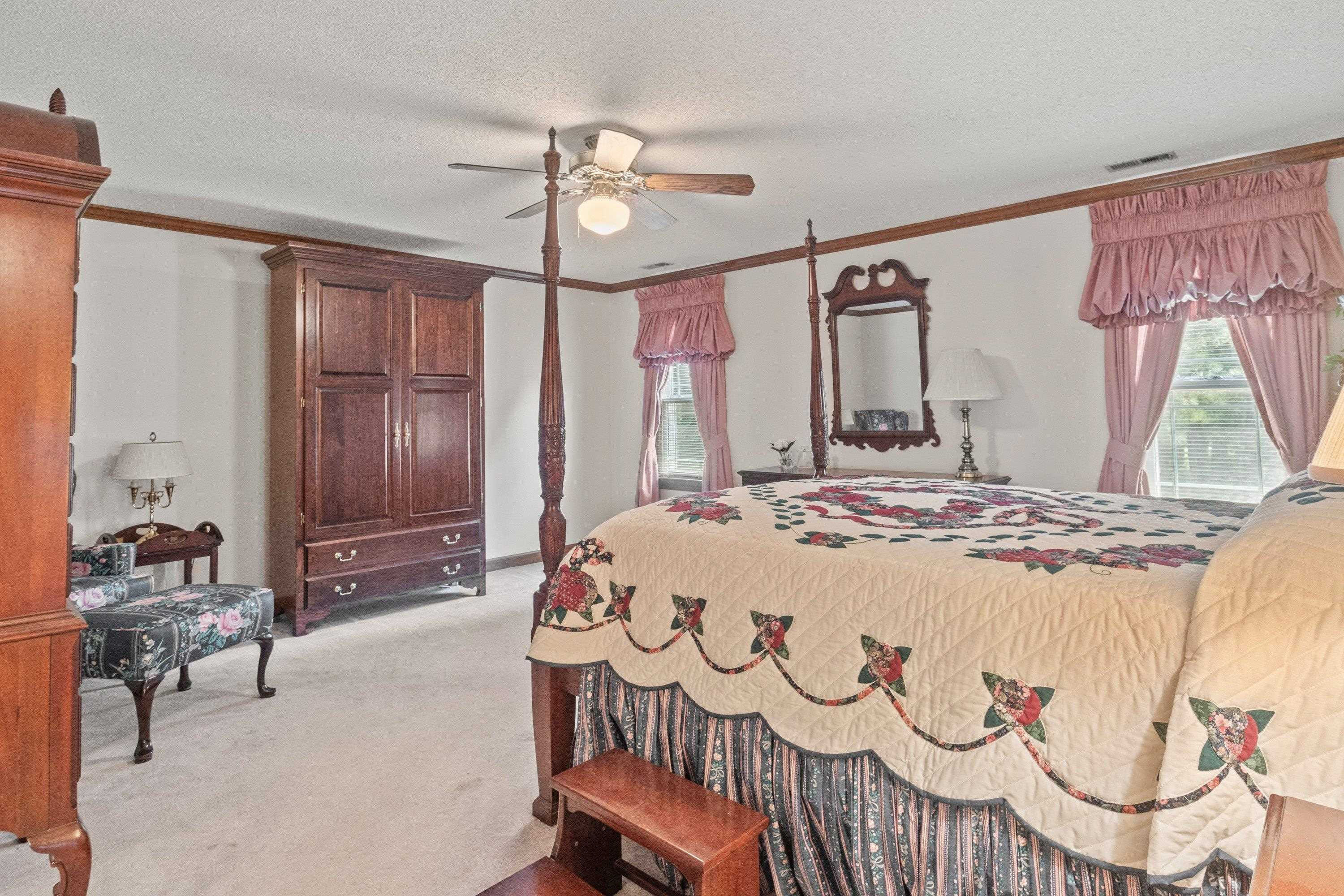 8501 Crowder Road Raleigh, NC 27603 - Photo 36 of 60 Spacious primary bedroom that makes a great space to get away from it all. Primary Bedroom