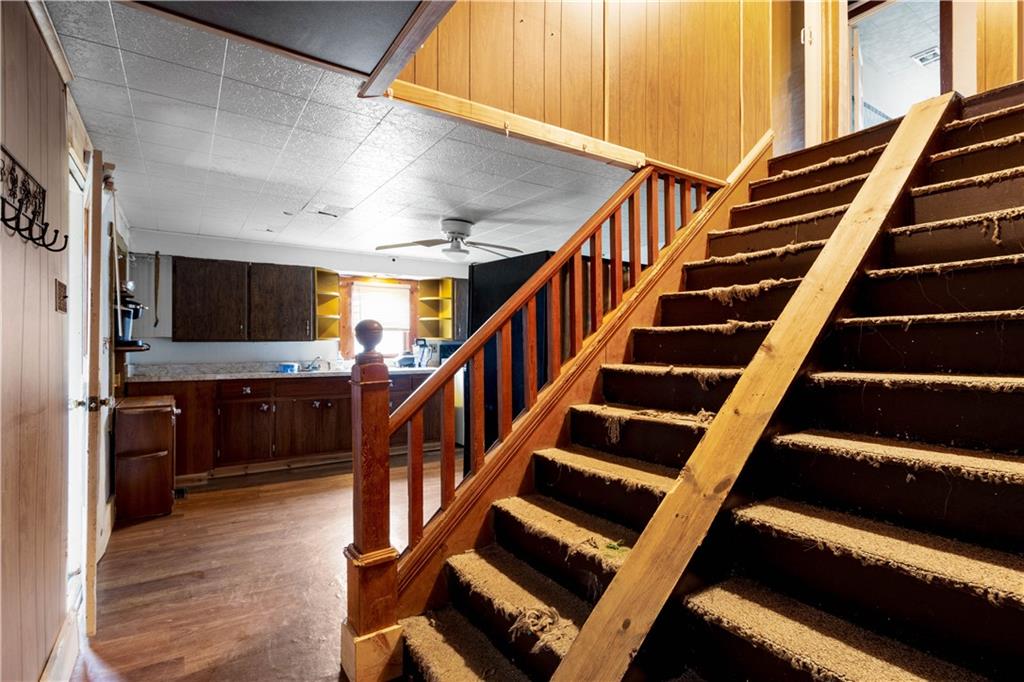 11 Madison Street Cokeburg, PA 15324 - Photo 12 of 35 a view of entryway with wooden floor and stairs