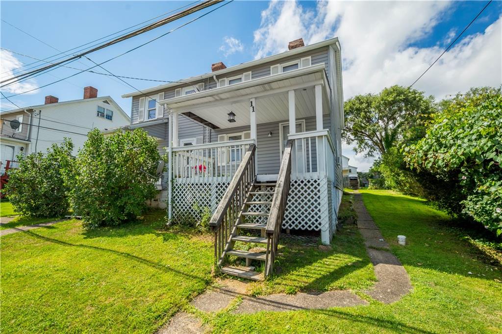 11 Madison Street Cokeburg, PA 15324 - Photo 2 of 35 a view of a house with a yard