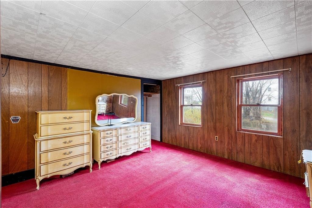 11 Madison Street Cokeburg, PA 15324 - Photo 21 of 35 an empty room with furniture and a window