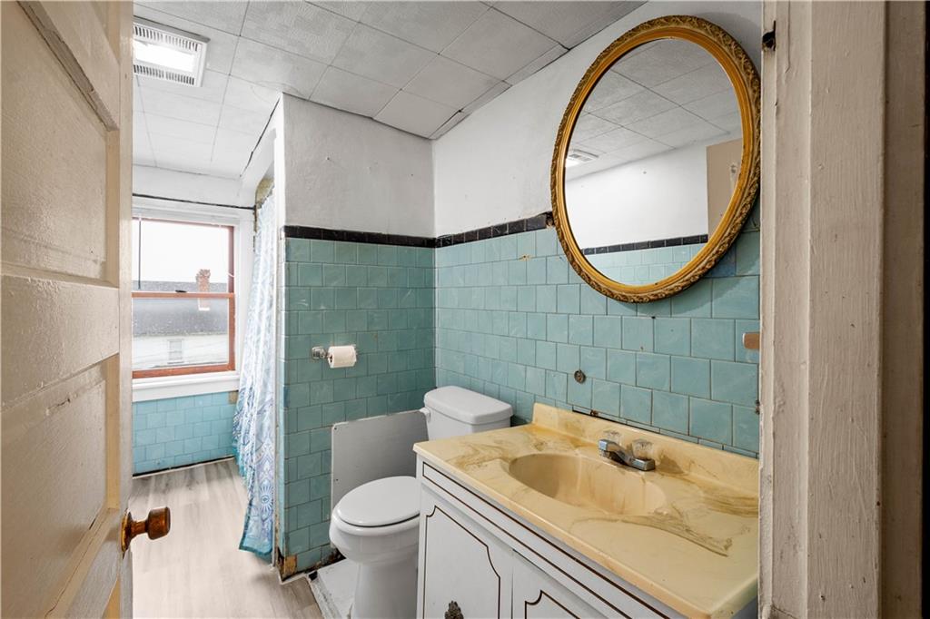 11 Madison Street Cokeburg, PA 15324 - Photo 25 of 35 a bathroom with a sink and a mirror