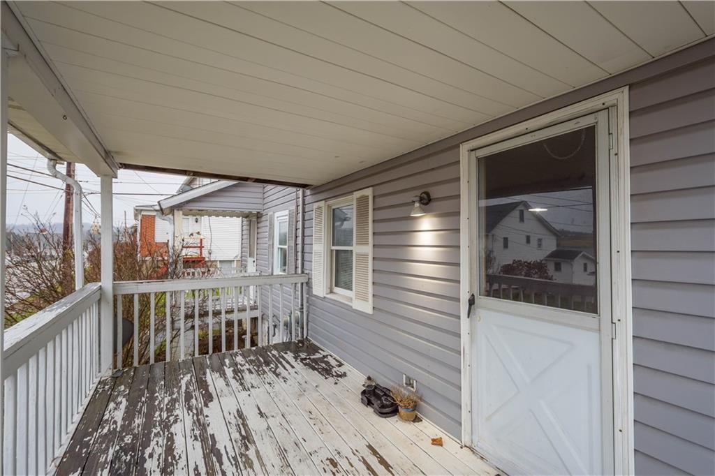11 Madison Street Cokeburg, PA 15324 - Photo 5 of 35 a view of a balcony with wooden floor