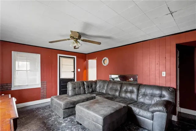 a living room with furniture and a window