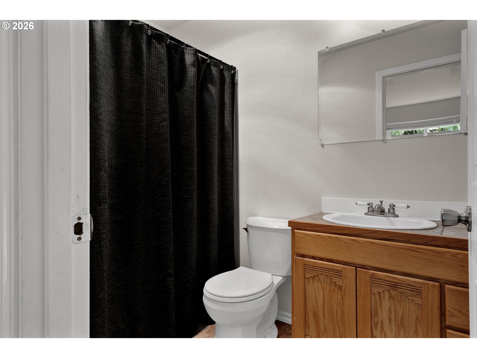 76554 Bobbe Way Oakridge, OR 97463 - Photo 17 of 47 a bathroom with a sink vanity mirror and toilet