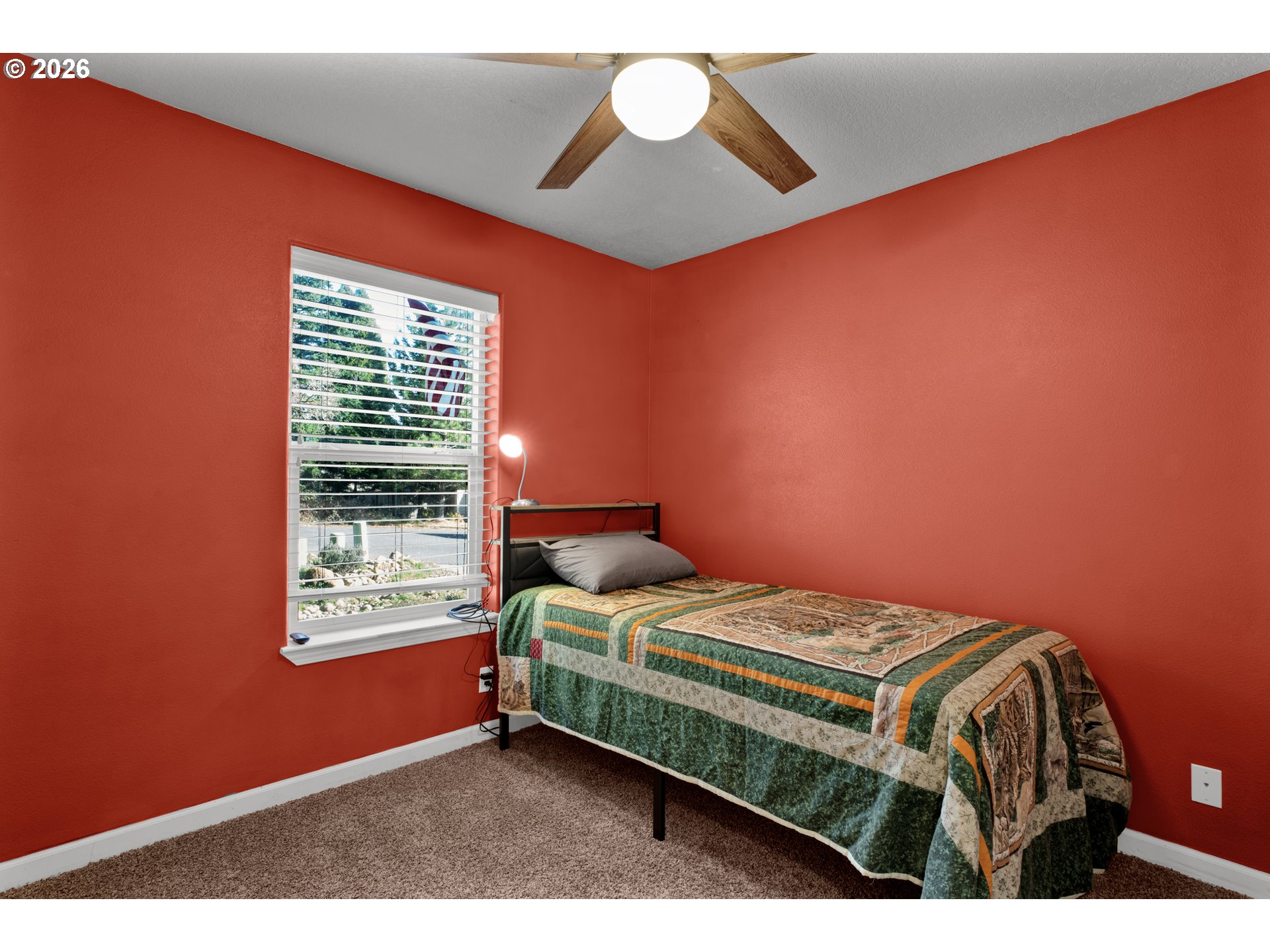 76554 Bobbe Way Oakridge, OR 97463 - Photo 23 of 47 a bedroom with a bed and a window