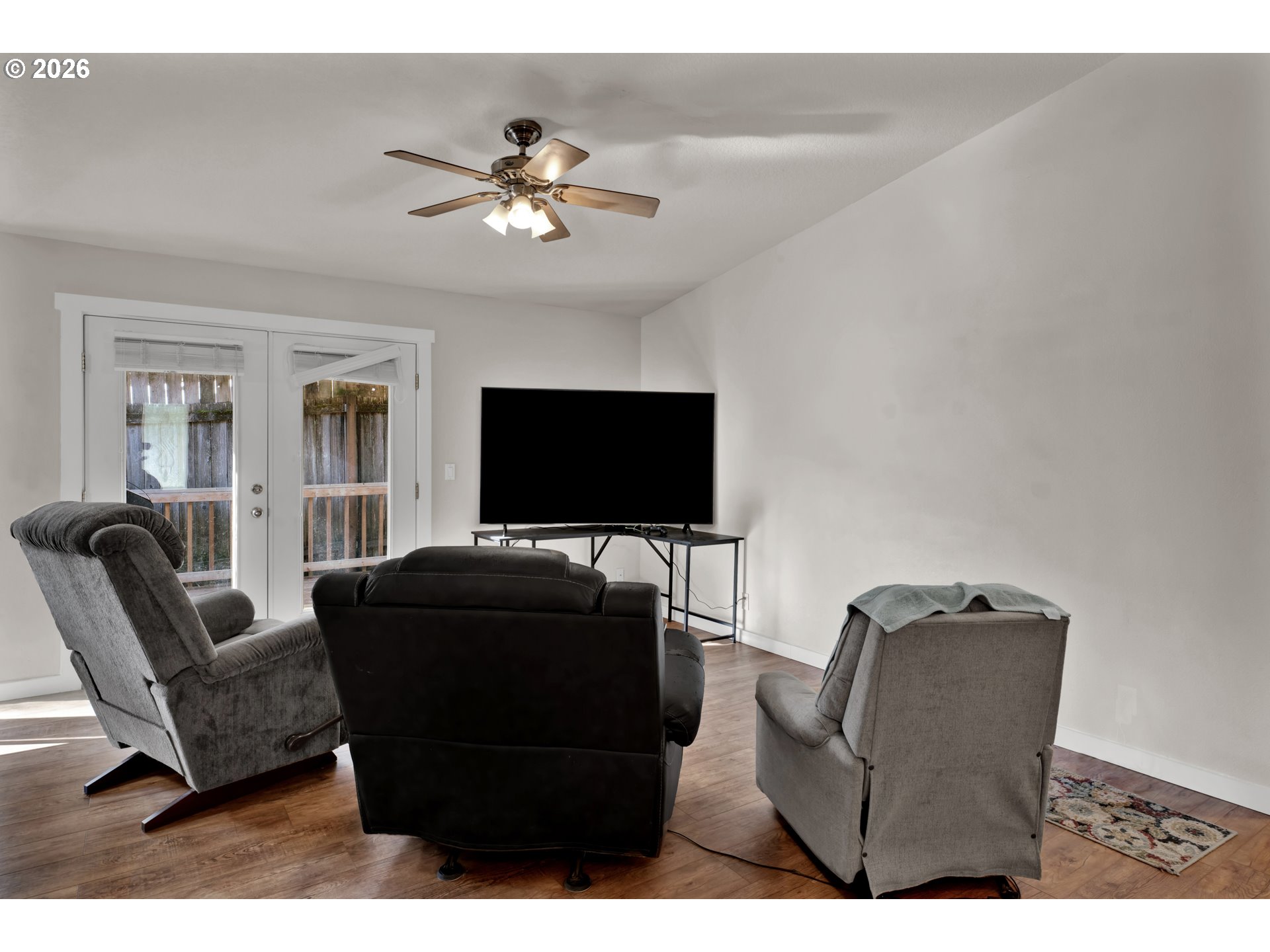 76554 Bobbe Way Oakridge, OR 97463 - Photo 37 of 47 a living room with furniture and a flat screen tv