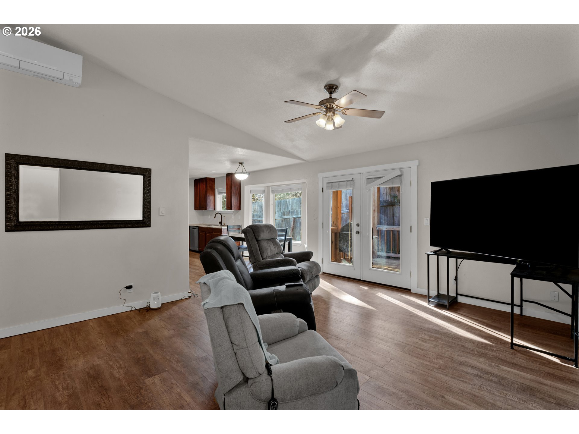 76554 Bobbe Way Oakridge, OR 97463 - Photo 38 of 47 a living room with furniture and a flat screen tv