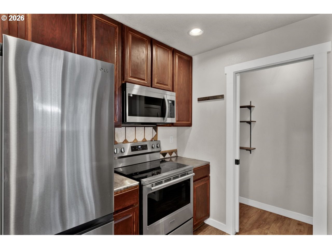 76554 Bobbe Way Oakridge, OR 97463 - Photo 47 of 47 a kitchen with stainless steel appliances a refrigerator and a stove