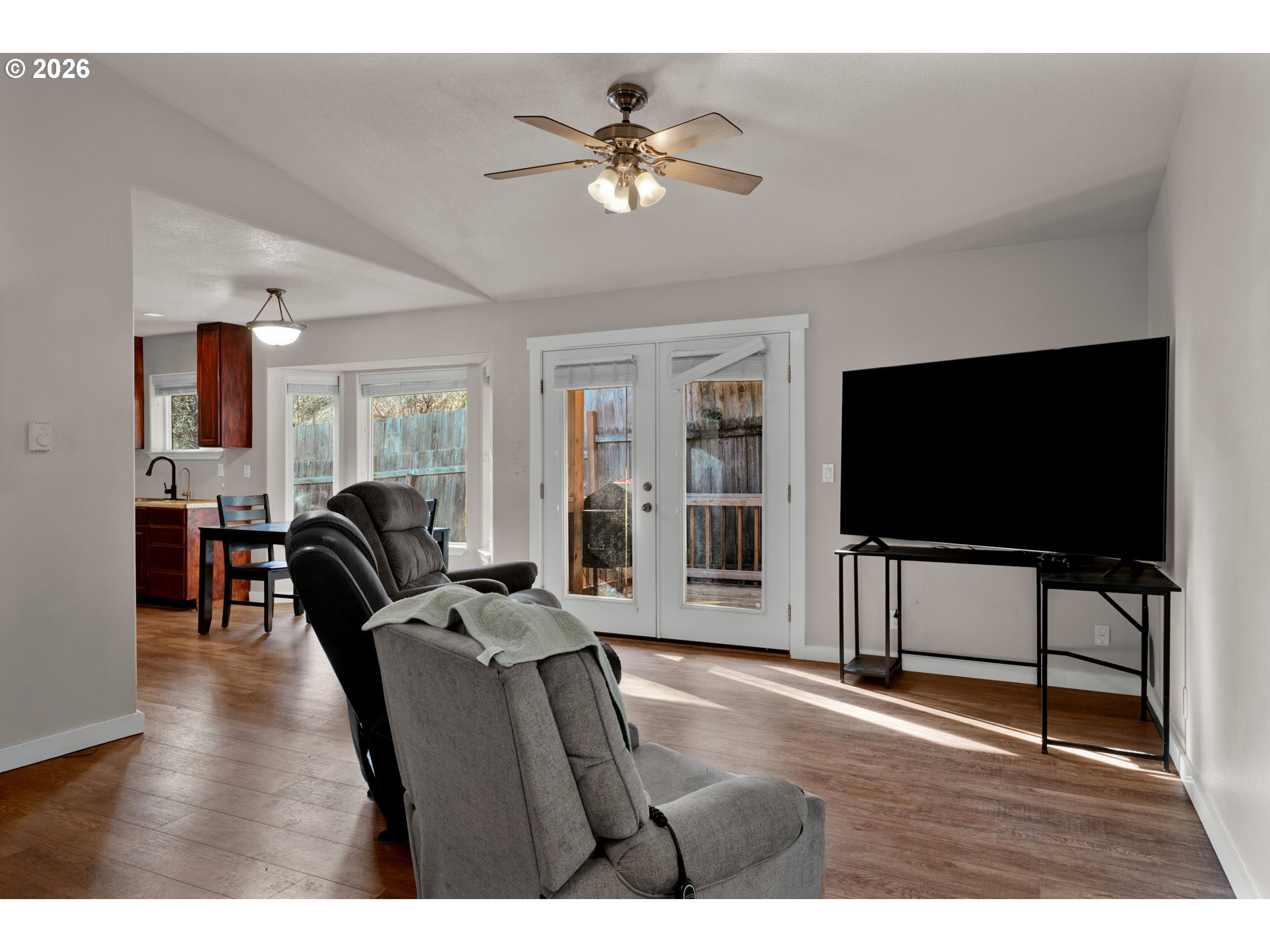 76554 Bobbe Way Oakridge, OR 97463 - Photo 7 of 47 a living room with furniture and a flat screen tv