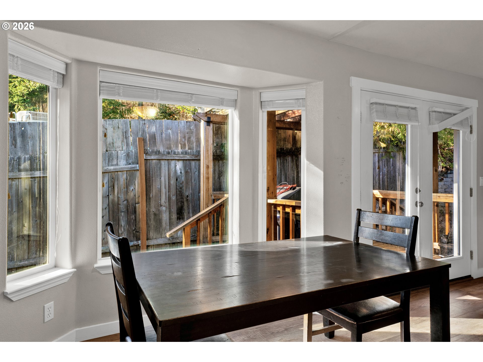 76554 Bobbe Way Oakridge, OR 97463 - Photo 8 of 47 a view of a dining room with furniture and a window