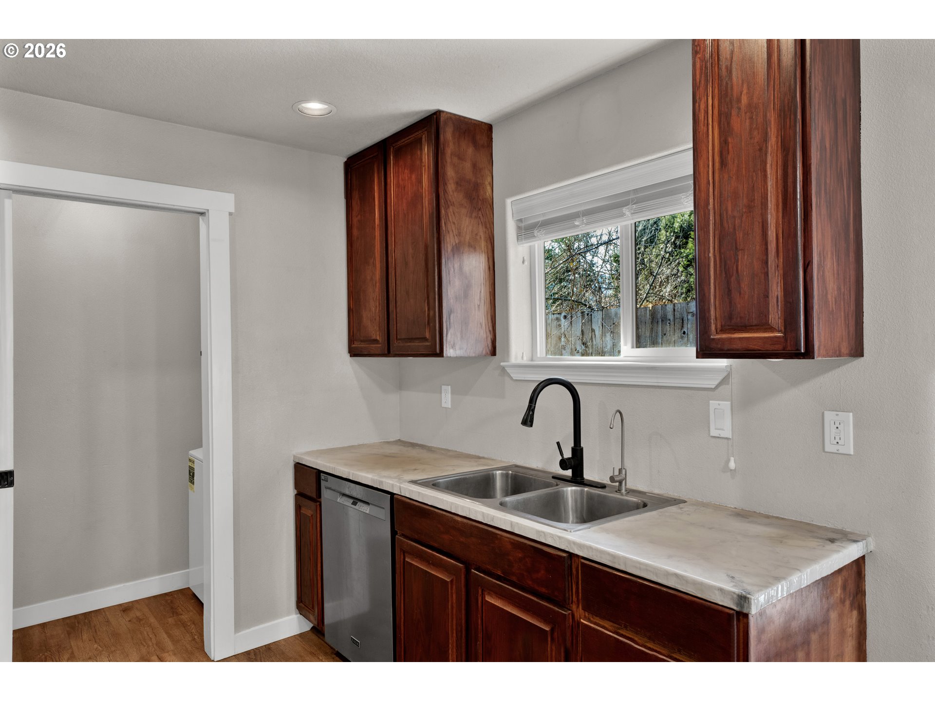 76554 Bobbe Way Oakridge, OR 97463 - Photo 10 of 47 a kitchen with a sink and cabinets