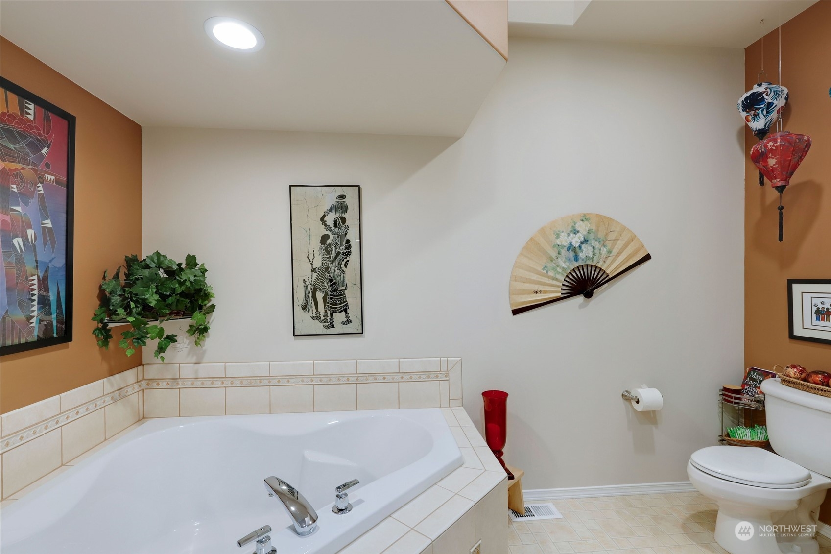 421 Blakely Boulevard Sequim, WA 98382 - Photo 22 of 35 a bath tub sitting next to a white toilet and a shower