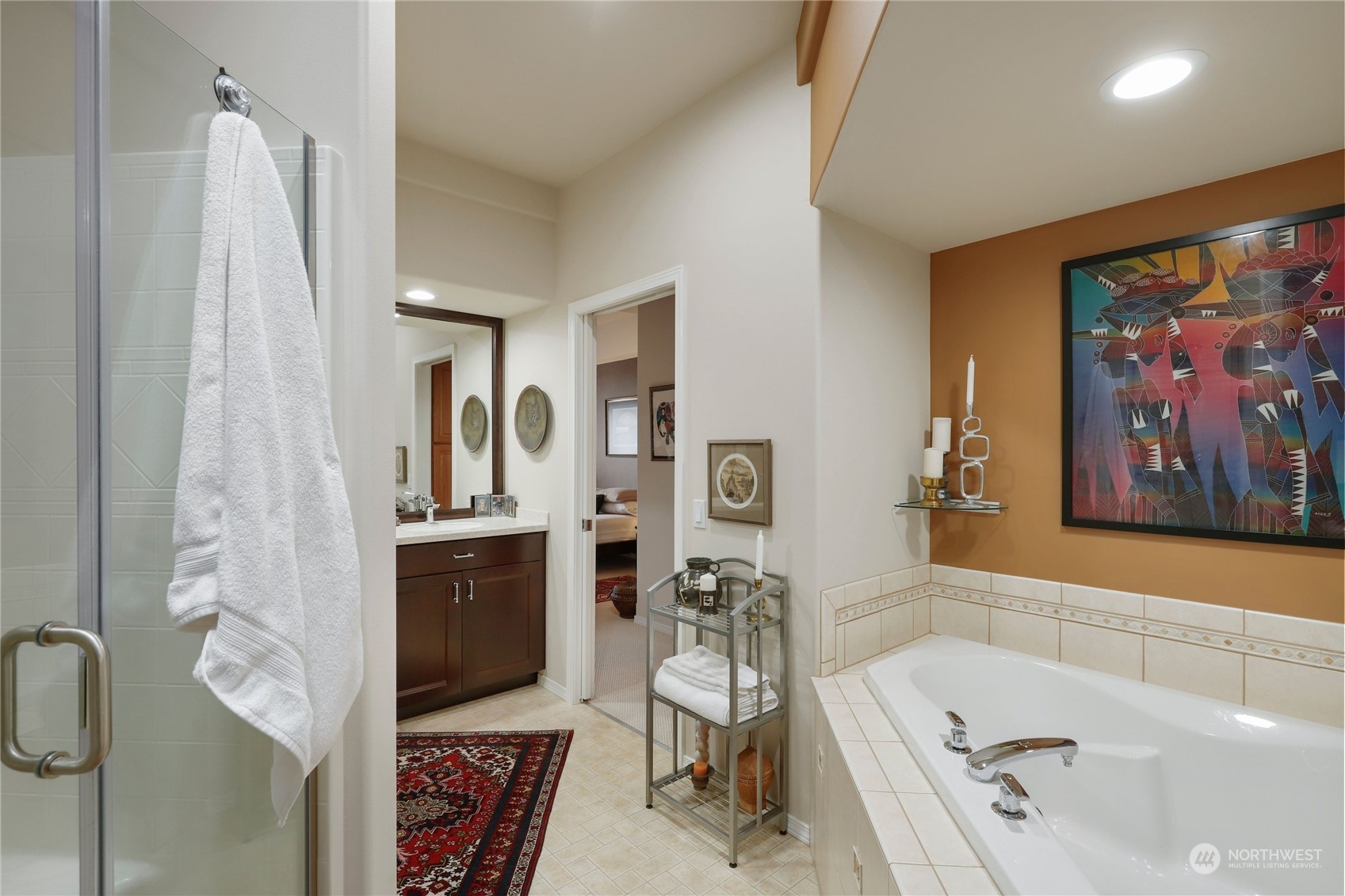 421 Blakely Boulevard Sequim, WA 98382 - Photo 23 of 35 a bathroom with a tub sink and mirror