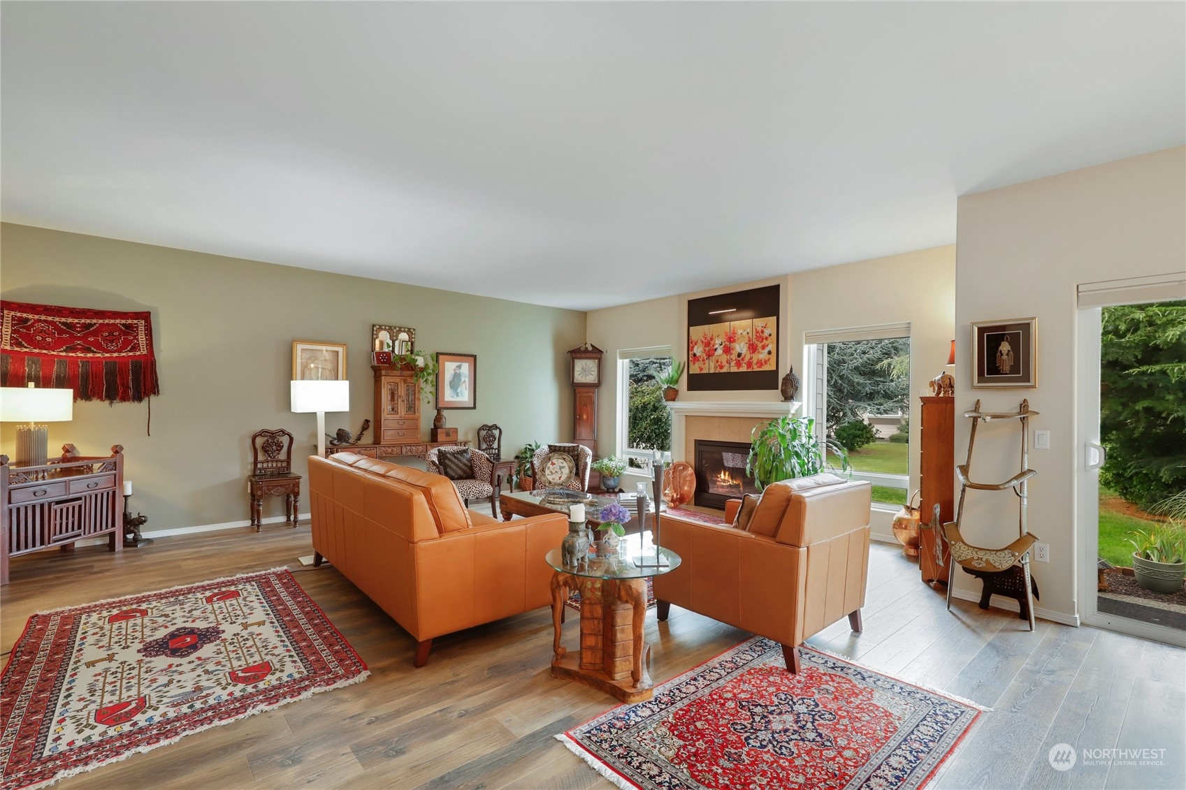 421 Blakely Boulevard Sequim, WA 98382 - Photo 5 of 35 a living room with furniture and a fireplace