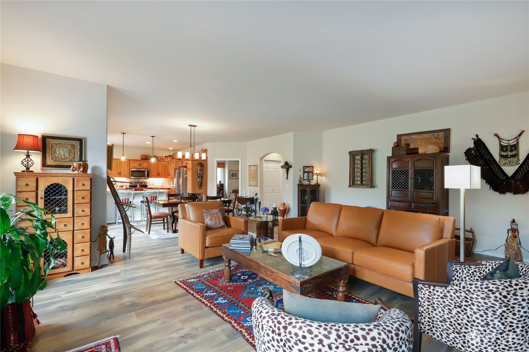 421 Blakely Boulevard Sequim, WA 98382 - Photo 6 of 35 a living room with furniture a rug and a table
