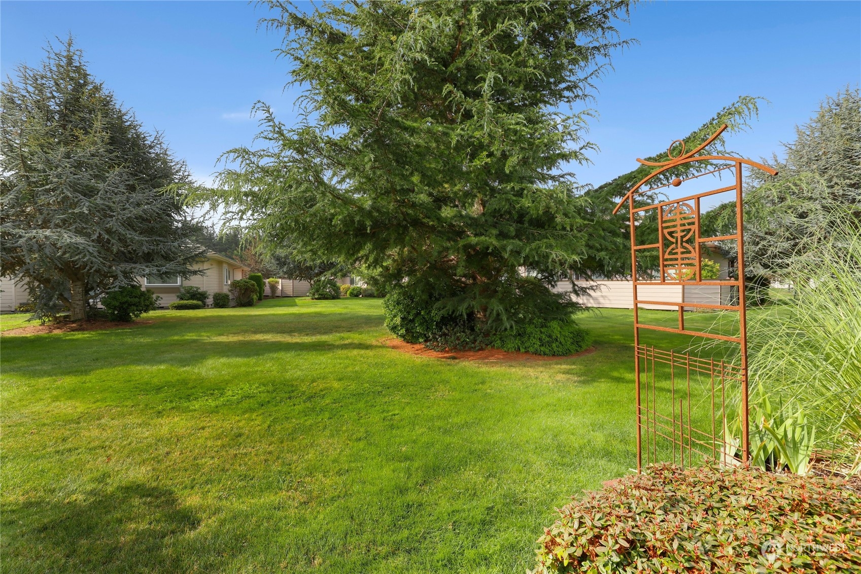 421 Blakely Boulevard Sequim, WA 98382 - Photo 10 of 35 a view of a park with a tree