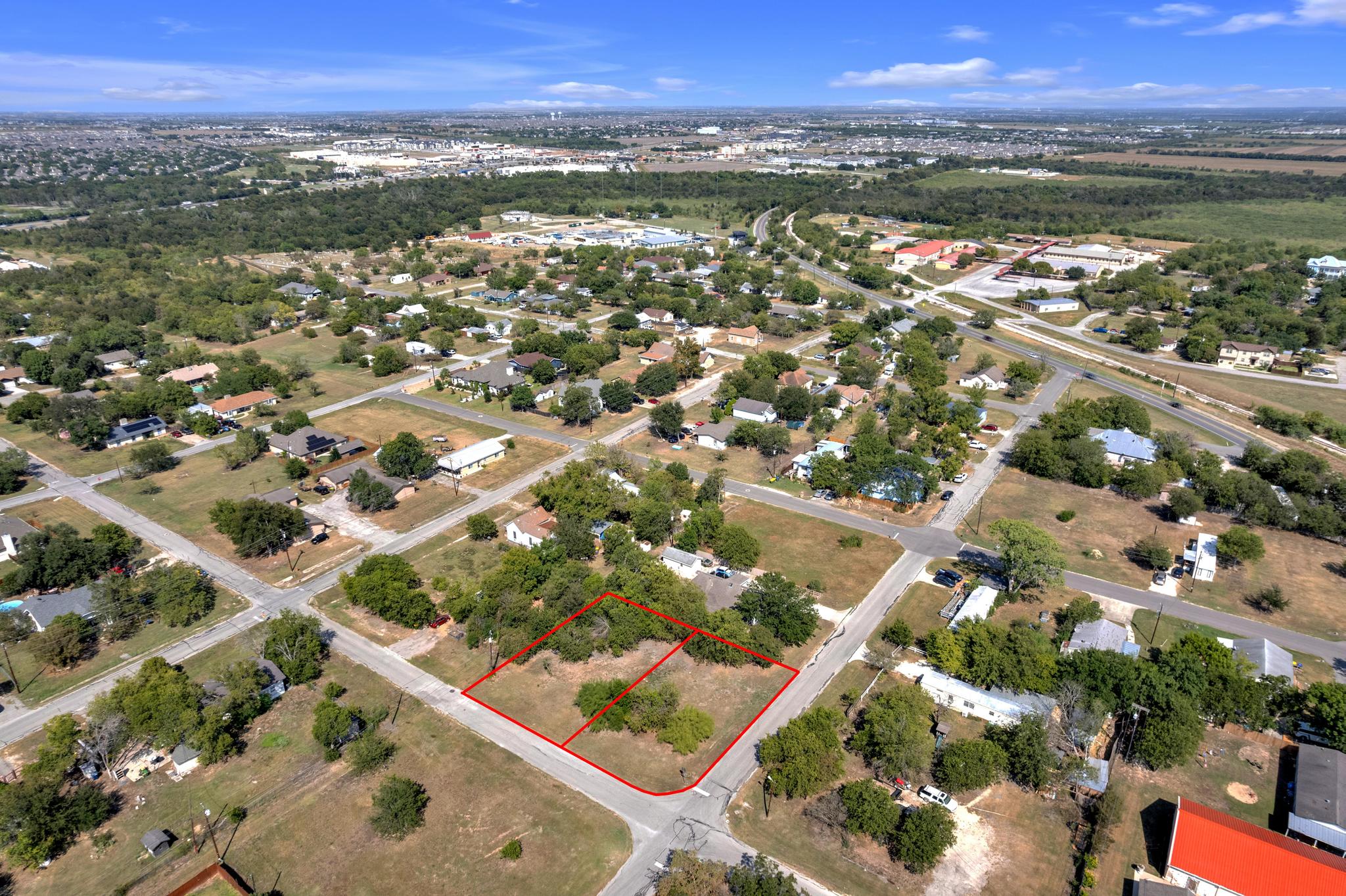 301 East Boyce Street Manor, TX 78653 - Photo 5 of 5 Aerial overview of property's location featuring property boundaries highlighted
