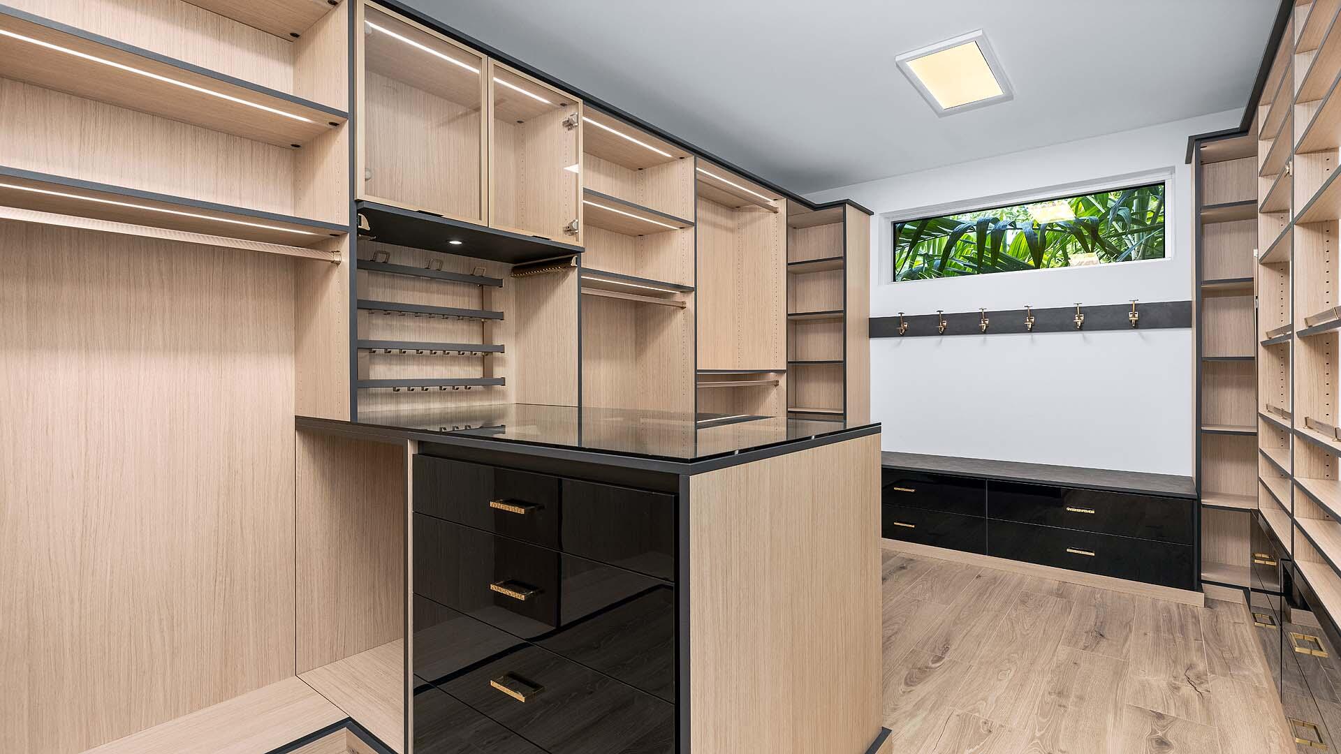 917 Bucida Road, Unit A Delray Beach, FL 33483 - Photo 18 of 36 a kitchen with stainless steel appliances cabinets and wooden floor