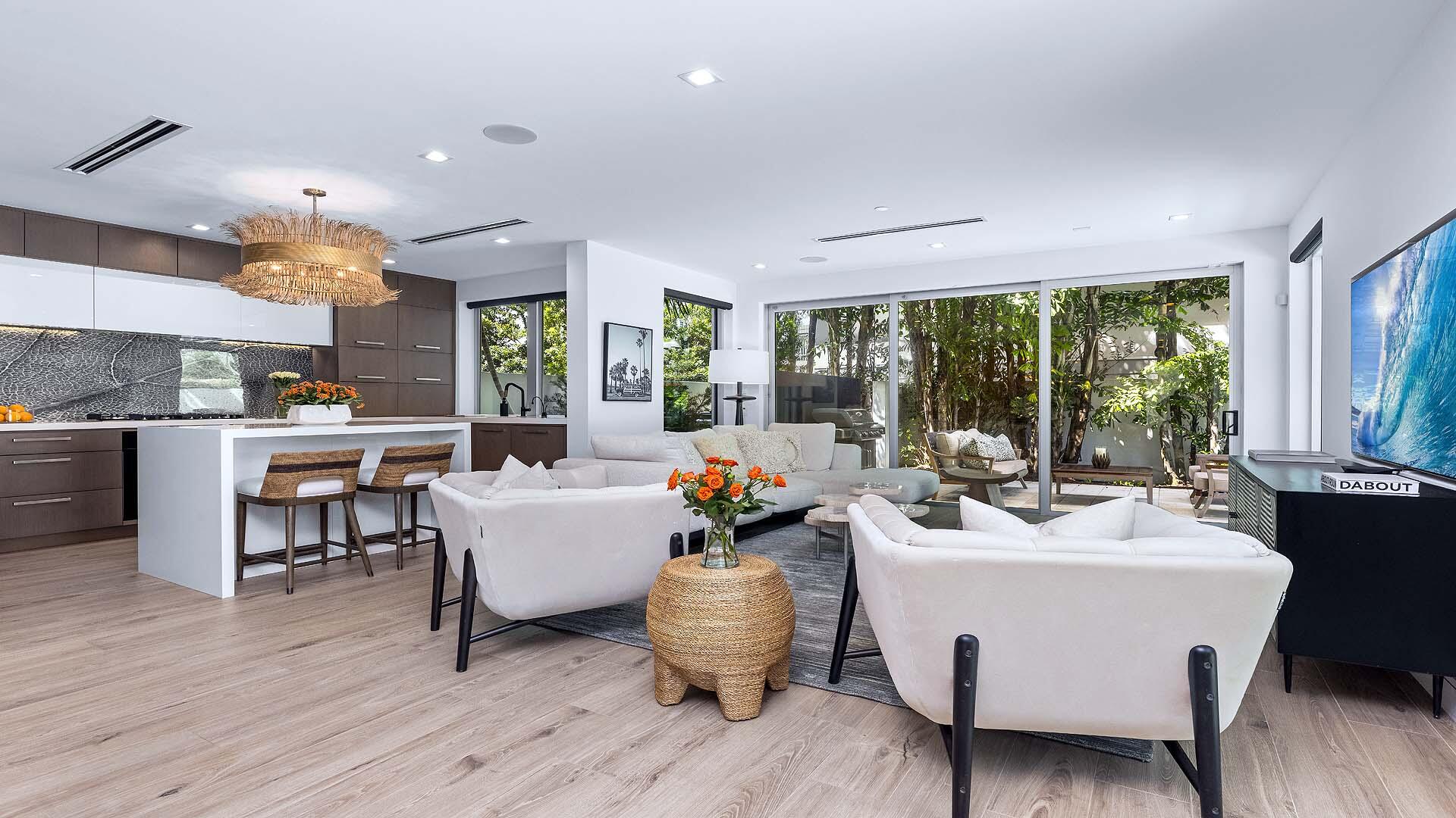 917 Bucida Road, Unit A Delray Beach, FL 33483 - Photo 3 of 36 a dining room with furniture window and wooden floor