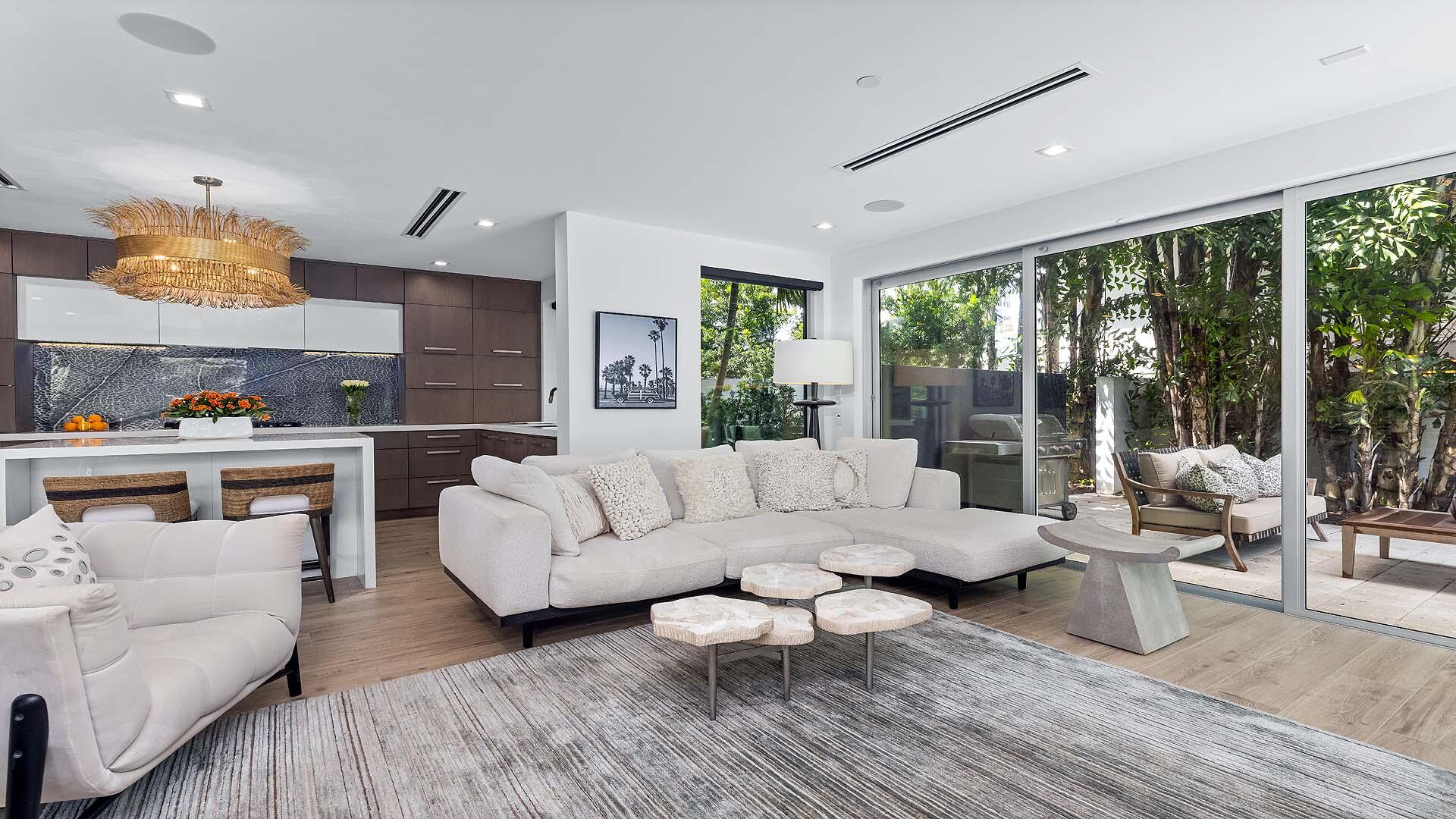 917 Bucida Road, Unit A Delray Beach, FL 33483 - Photo 5 of 36 a living room with furniture and a large window