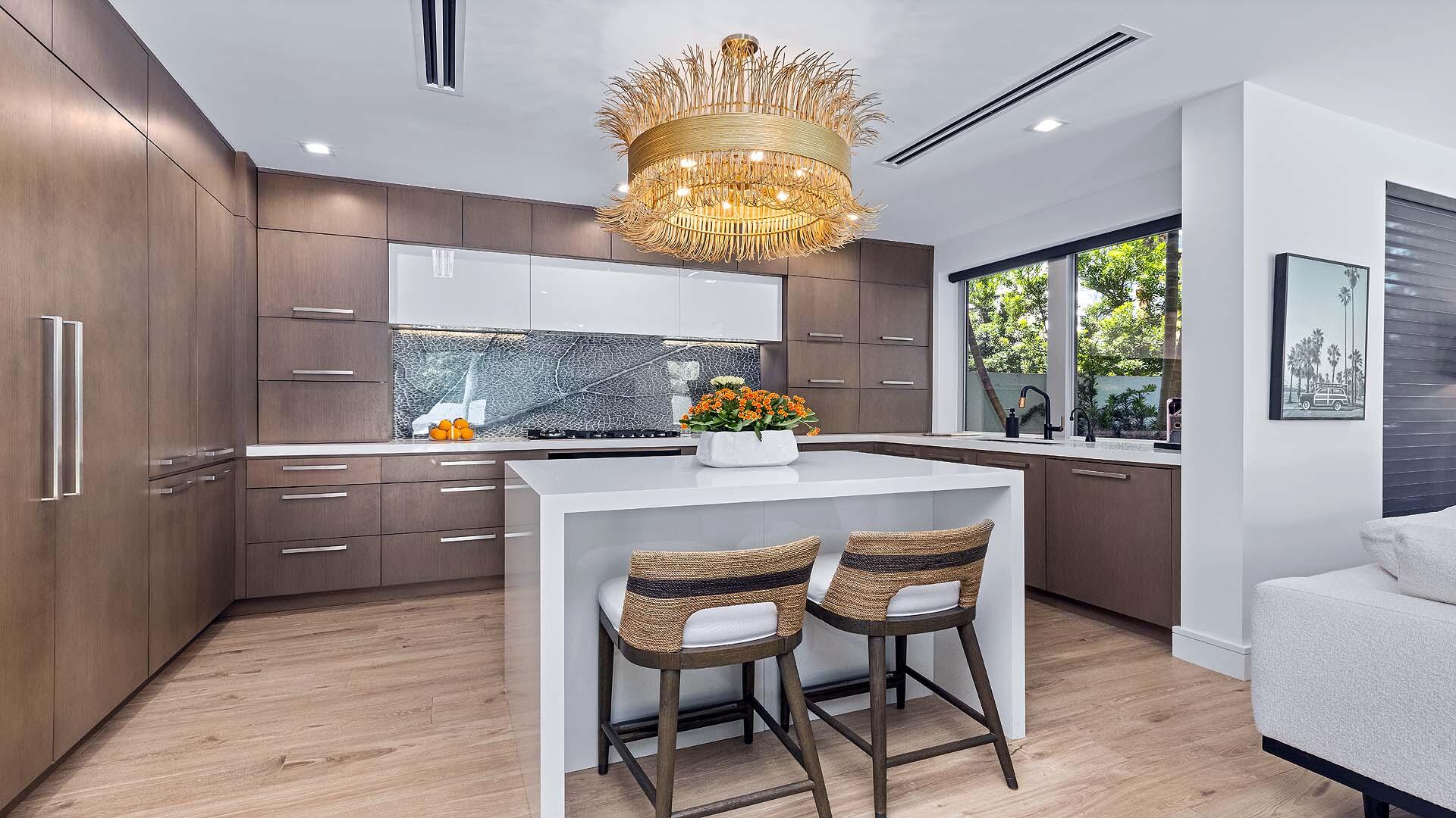 917 Bucida Road, Unit A Delray Beach, FL 33483 - Photo 6 of 36 a kitchen with a sink cabinets and window