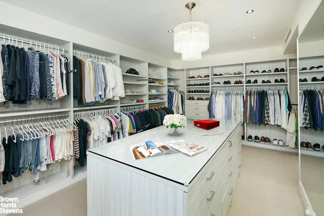 a view of kitchen center island and stainless steel appliances