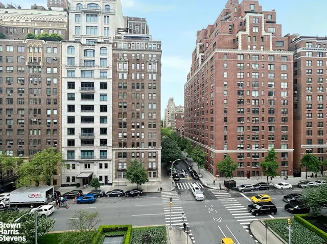 a view of a city with tall buildings