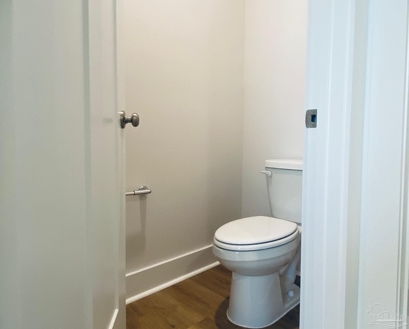 3021 Serviceberry Road Cantonment, FL 32533 - Photo 13 of 21 a bathroom with a toilet and a shower