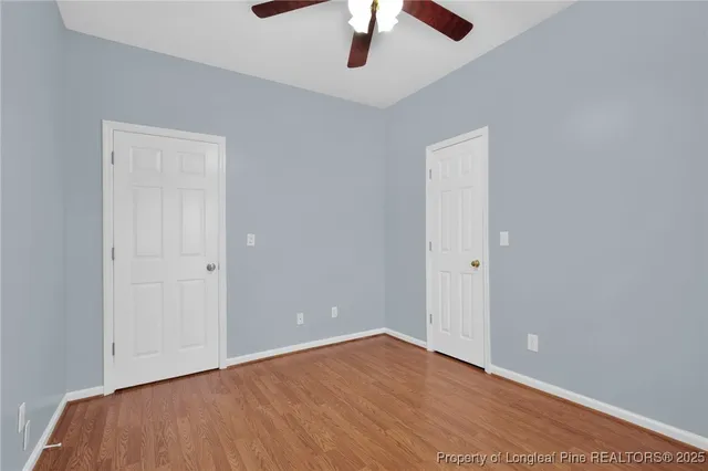 a bathroom with a sink toilet mirror and shower