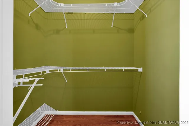 a bathroom with a sink vanity and a mirror